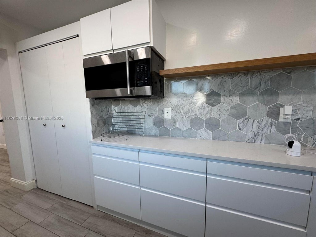 Photo of 2732 NW 4th Ct, Pompano Beach, FL 33069 (MLS # A11828383)