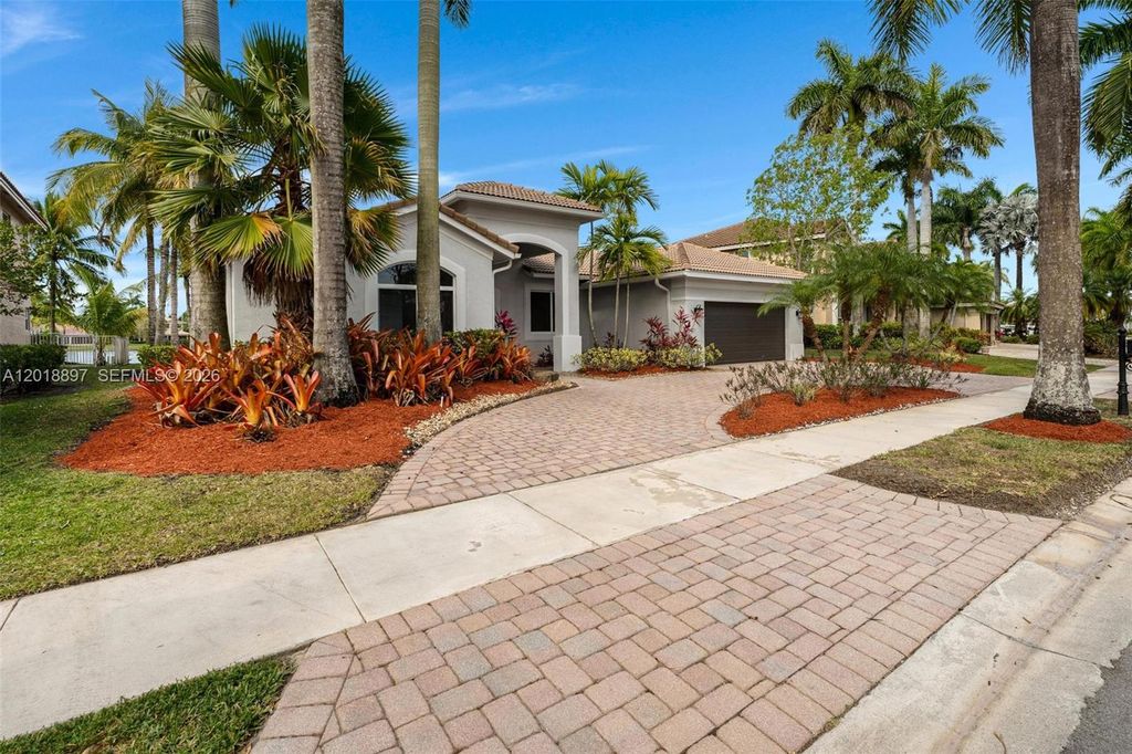 Photo of 1666 Victoria Pointe Cir, Weston, FL 33327 (MLS # A12018897)