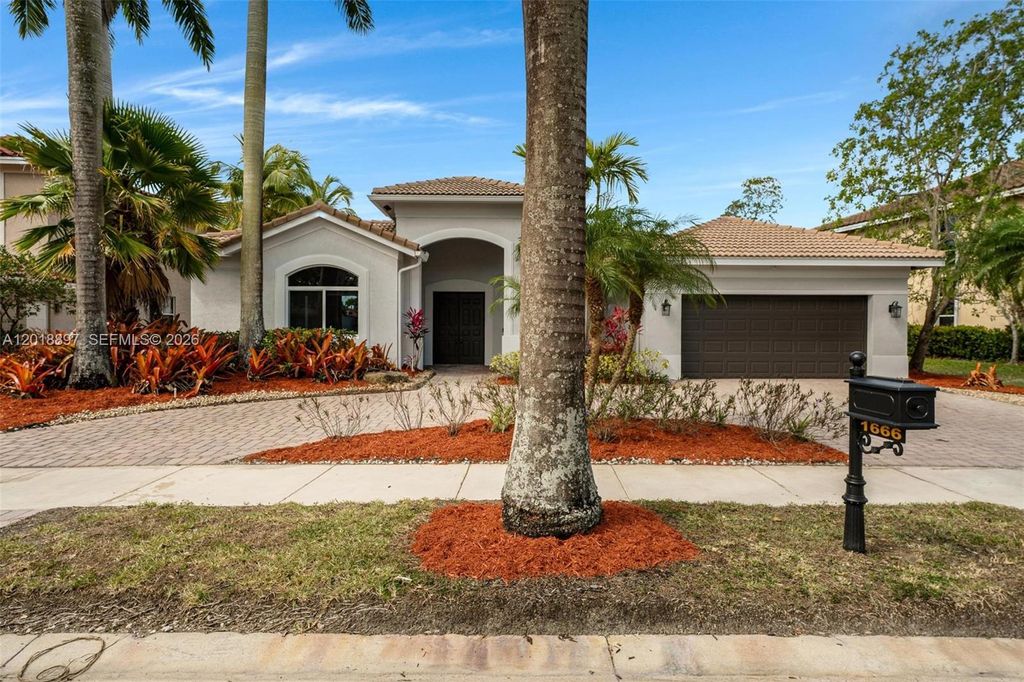 Photo of 1666 Victoria Pointe Cir, Weston, FL 33327 (MLS # A12018897)