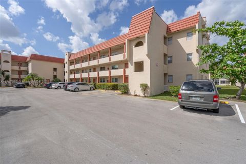 Photo of 8040 N Sunrise Lakes Dr #106, Sunrise, FL 33322 (MLS # A11767082)