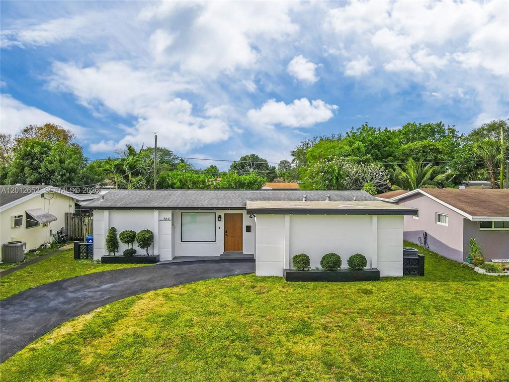 Photo of 8610 NW 25th St, Sunrise, FL 33322 (MLS # A12012652)