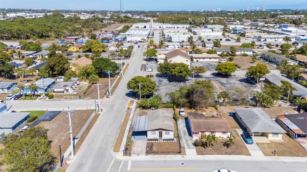 Photo of 1296 W 36th St, Riviera Beach, FL 33404 (MLS # A12017800)