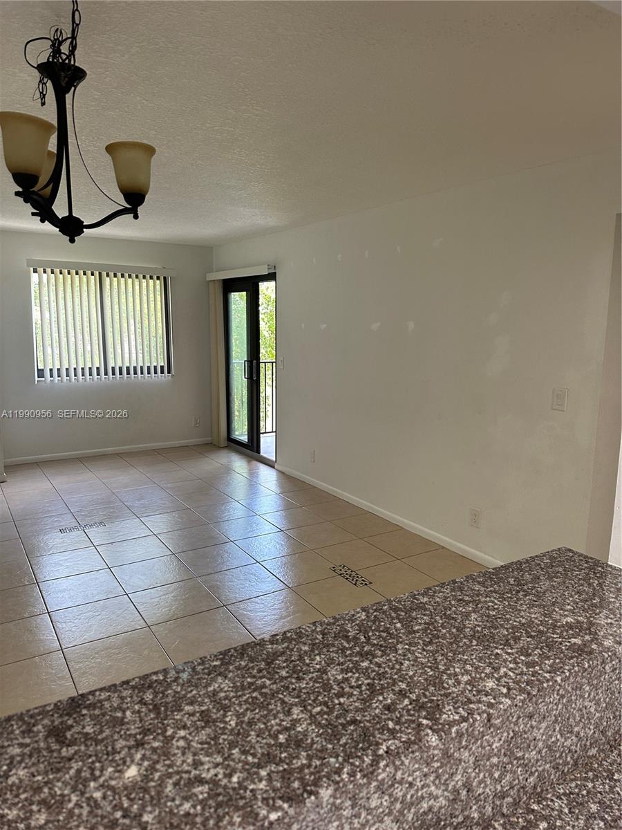 Photo of 10001 W Atlantic Blvd #215, Coral Springs, FL 33071 (MLS # A11990956)