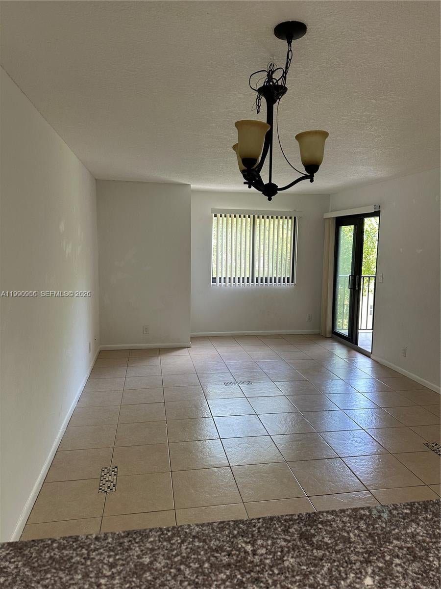 Photo of 10001 W Atlantic Blvd #215, Coral Springs, FL 33071 (MLS # A11990956)