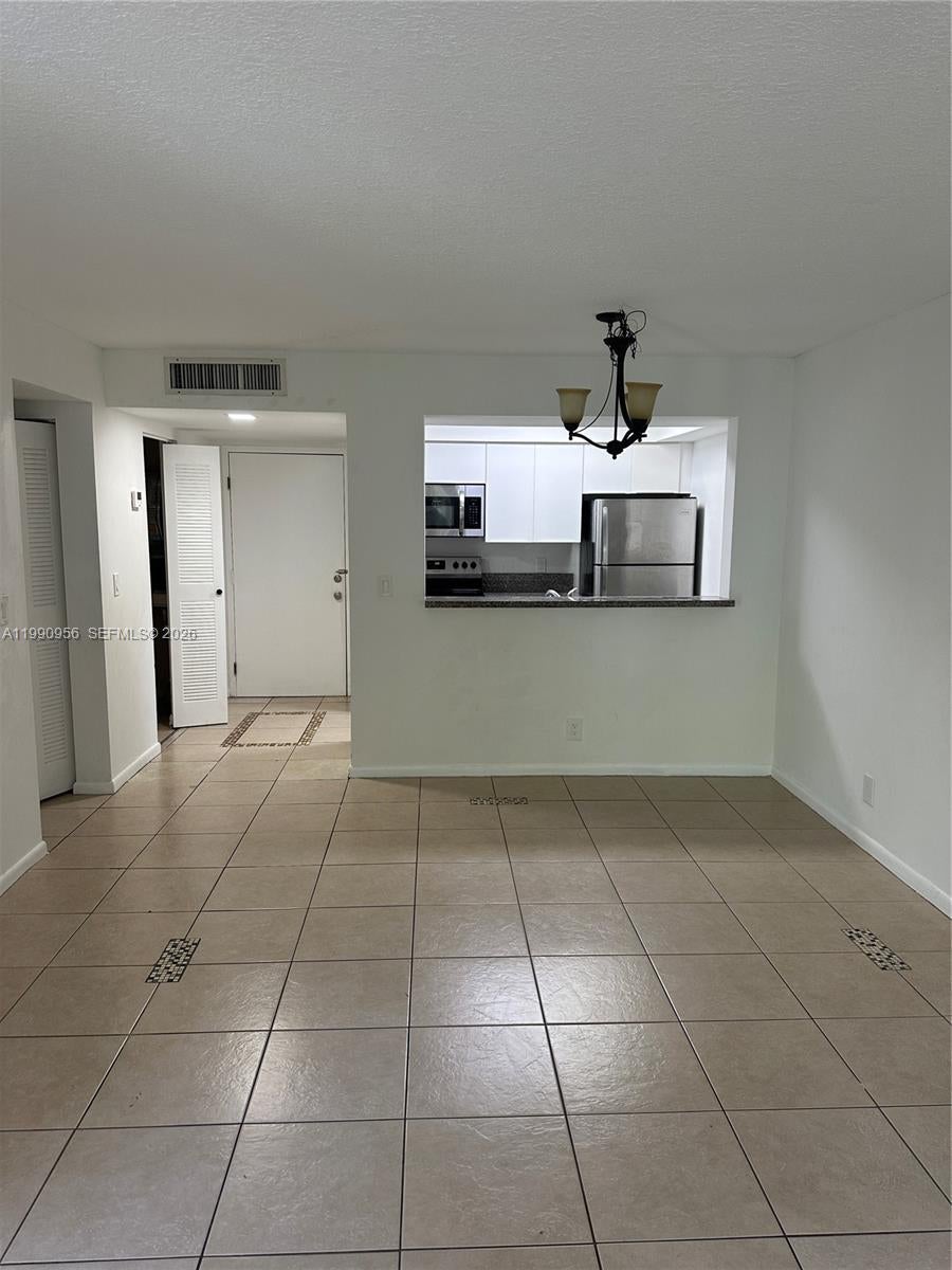 Photo of 10001 W Atlantic Blvd #215, Coral Springs, FL 33071 (MLS # A11990956)