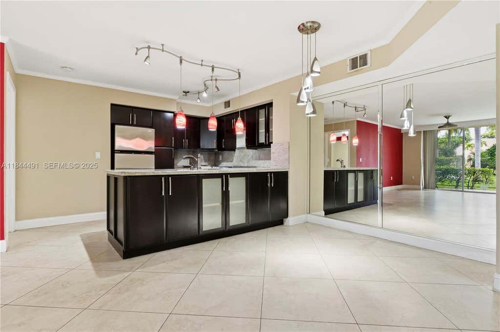 Photo of 1733 Village Blvd #108, West Palm Beach, FL 33409 (MLS # A11844491)