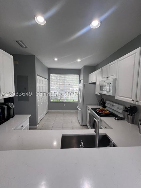 Photo of 681 NW 42nd Ave, Plantation, FL 33317 (MLS # A12033649)