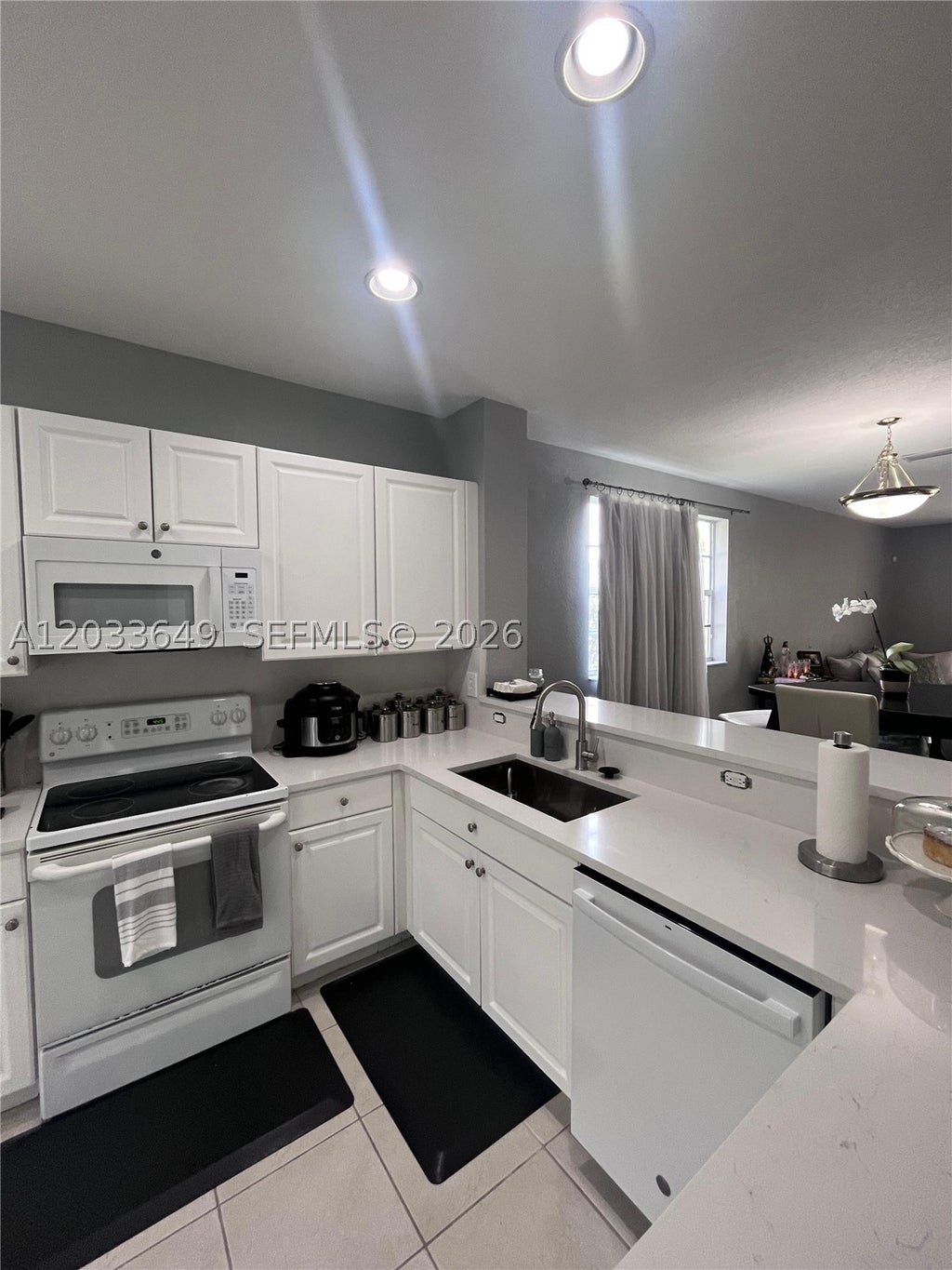 Photo of 681 NW 42nd Ave, Plantation, FL 33317 (MLS # A12033649)