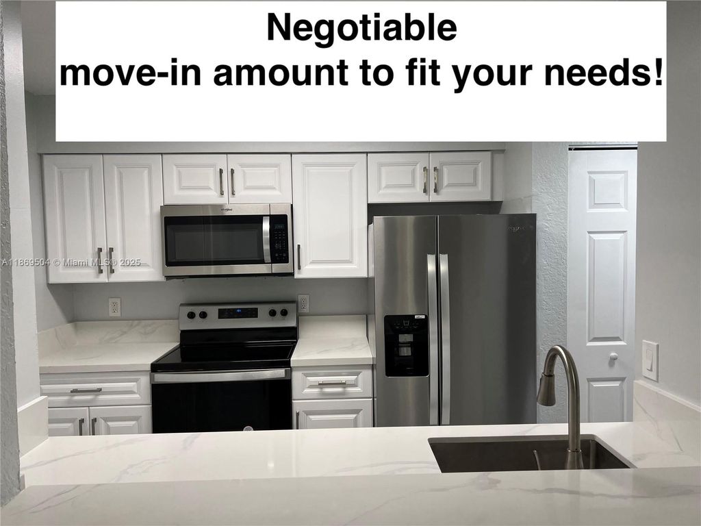 Photo of 2871 N Oakland Forest Dr #102, Oakland Park, FL 33309 (MLS # A11869504)