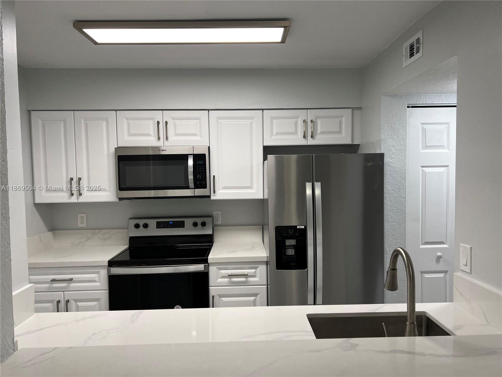 Gorgeous 2/2 condo in Lakeview Club of Oakland Forest, first floor, renovated condo, beautiful laminate vinyl flooring, stainless steel appliances, bathroom updates, side washer and dryer. Plenty of parking, convenient location, close to shopping, restaurants, and just minutes from Wilton Manors nightlife. The minimum credit required by the association is 620 or higher.