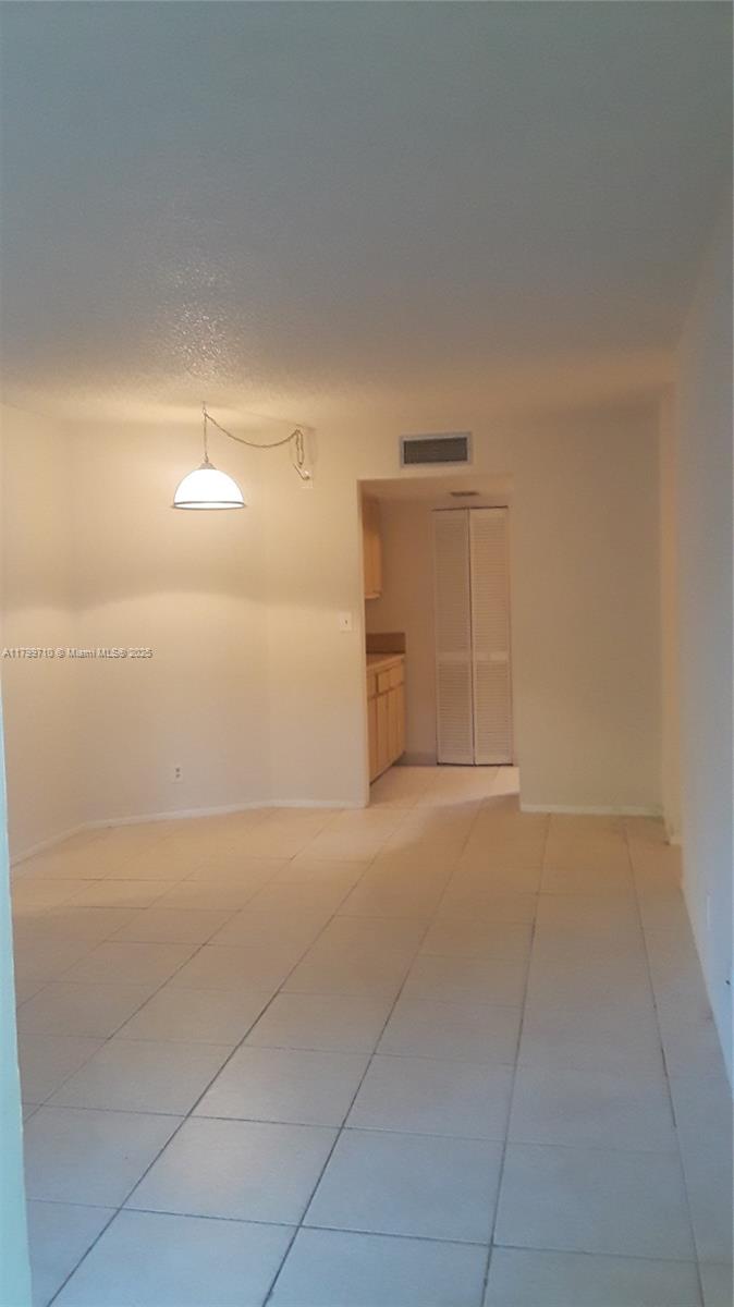 303 Gardens Dr 105