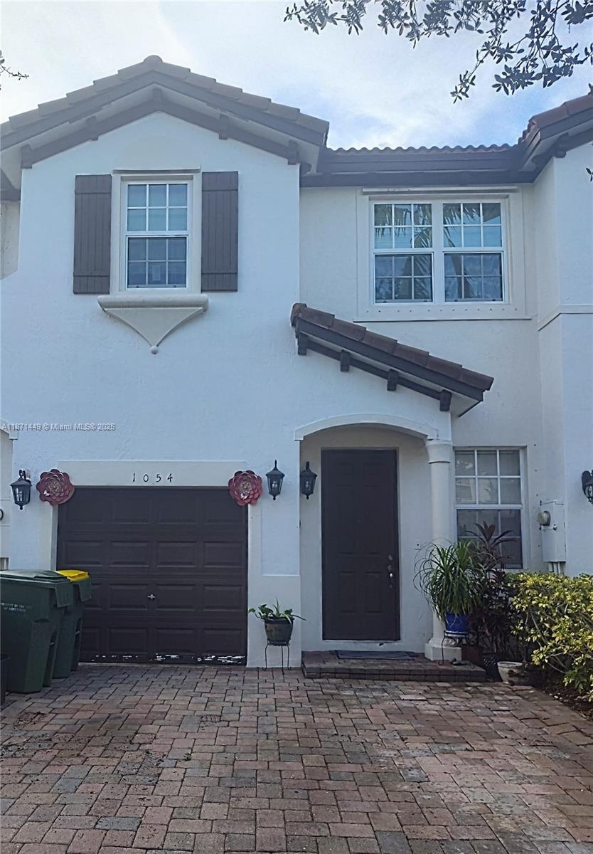 Spacious 4-bedroom townhouse located in the gated community of Villas at Portofino East. This quiet enclave of just 86 homes offers a family-friendly environment with convenience at your doorstep. The home features a thoughtfully designed layout with a half bath on the first floor, a 1-car garage plus space for two additional vehicles in front. Supermarkets, pharmacies, and a hospital are all within walking distance.