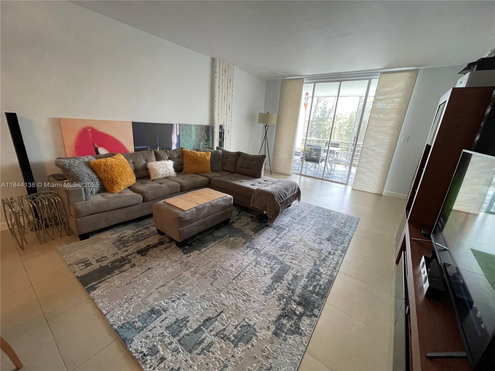 Fully furnished waterfront 1 bedroom 1,5 bathrooms condo, located on the beautiful Eastern Shores with a police guarded gate. Just minutes from Sunny Isle Beach and within walking distance to shops, restaurants, Wind Dixie and VIP movie theaters. You will love to live at this location. The condo is on the 3rd. floor and faces the water with an oversize screened terrace. Remodeled kitchen, all tiled floors. Available NOW