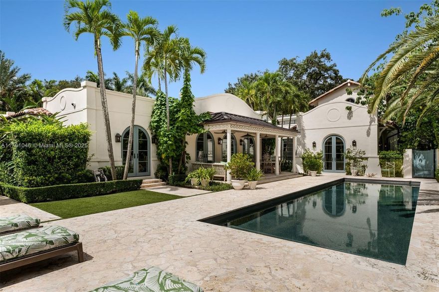 Step into a world of refined elegance with this meticulously restored 1920s Spanish Colonial, a 6,828 SF, 6BD, 6BA sanctuary nestled in the exclusive gated community of Ye Little Wood. Completed in 2023, and featured in Architectural Digest, the home harmoniously blends historic details with contemporary design. Host with ease in the expansive living, dining, and chef’s kitchen. The spacious main suite with spa-like bath and dual custom closets, provide luxurious accommodations. A separate guest wing offers privacy, while a second-floor office and patio create a tranquil workspace. A lushly landscaped oasis features a sparkling pool, patio, and detached pool house. Carefully selected color palettes and designer elements elevate every space, making this home a true masterpiece.