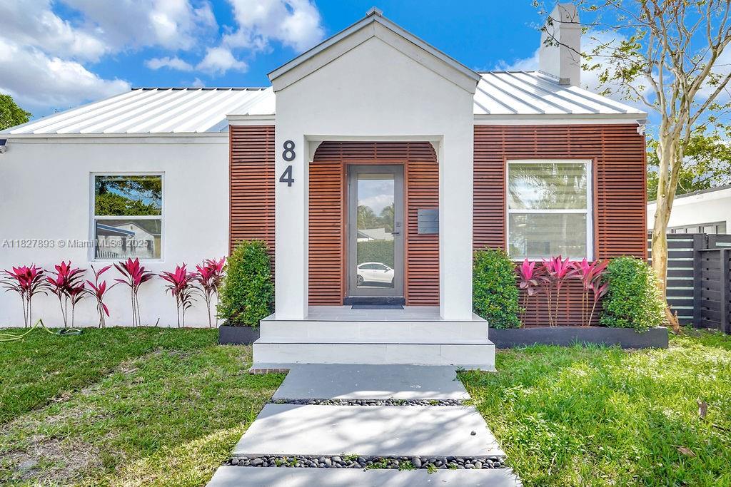 Spacious and beautifully maintained 4-bedroom, 3-bath single-family home located just steps from Miami’s vibrant Design District. This residence features a thoughtfully designed layout with a washer and dryer conveniently located inside. Enjoy a large, lushly landscaped yard perfect for relaxing or entertaining. Surrounded by tree-lined streets and close to world-class shopping, dining, and art, this home blends comfort and location in one of Miami’s most sought-after neighborhoods.
