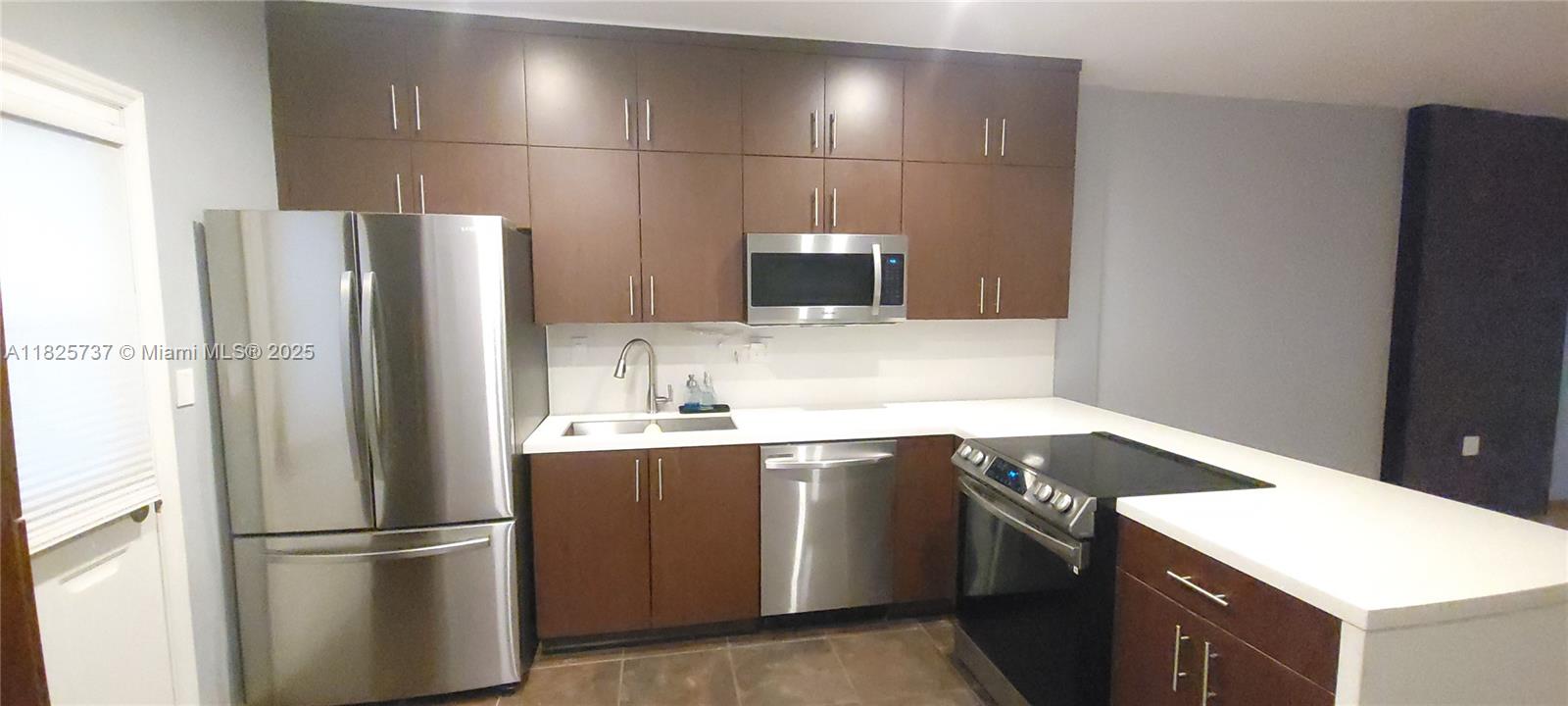 Welcome home to this cozy one bedroom condo located in the highly desirable area East of Biscayne. Recently refreshed kitchen with quartz countertops and newer appliances. This boutique style building is close to all that Miami is famous for. Restaurants, Shops and easy access to Miami Beach and Downtown Miami. Gated assigned parking, Pool and Laundry facilities make this the perfect place to call home.