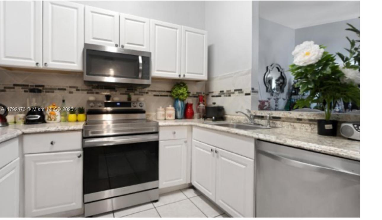 FIRST TIME HOME BUYER MOST SEE THIS BEAUTIFUL 3 BETHROOMS 2 BATHS IN BOCA RATON WEST HOME IN SOUGHT AFTER TUDOR WOODS,NEW ROOF IN 2018.THIS HOME HS VAULET CEILINGS,STAINLESS STEEL APPLIANCES,EAT-IN KITCHEN,TILE FLOORS,NICE SIZED BACK YARD/ SIDE YARD,VERY LOW HOA,COMMUNITY POOL AND PLAYGROUND.AND THIS HOUSE IN-READY TO MOVE IN.