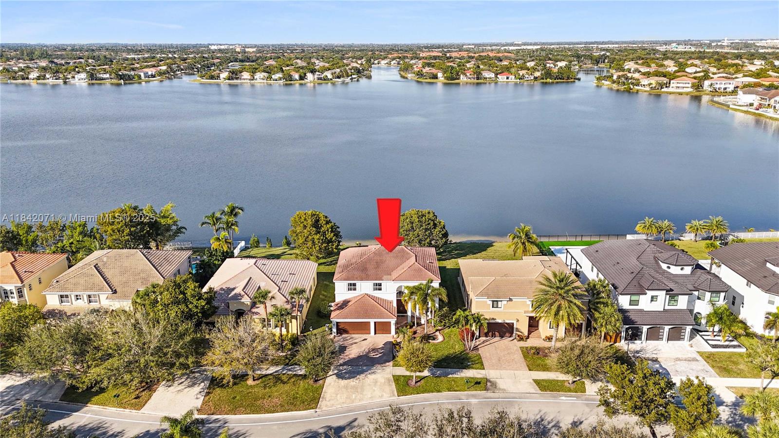 Experience resort-style living in this stunning lakefront home in the prestigious Riviera Isles community!This beautifully maintained 4-bed/3-bath residence offers the perfect combination of elegance & functionality across two spacious levels.Step inside to discover an open-concept layout filled w/natural light,a chef’s kitchen featuring a walk-in pantry,& a versatile first-floor flex room—ideal as a gym,office,or 5th bed—with a full bath conveniently located nearby.The expansive primary suite includes a private balcony w/ breathtaking views of the community’s largest lake,offering unmatched tranquility.Nestled in a guard-gated neighborhood w/premium amenities.Nearly every room captures stunning water views,making it the perfect South Florida retreat for both everyday living & entertaining