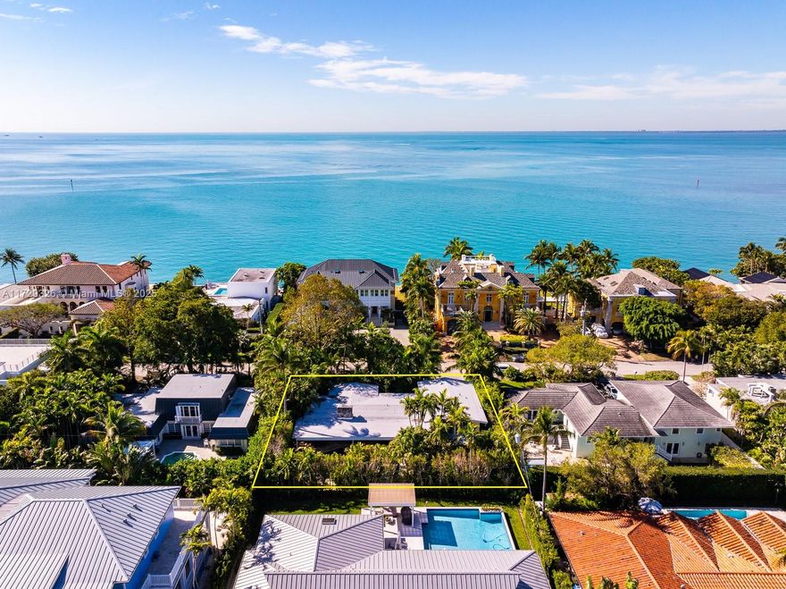 A rare chance to own an exceptional Florida style home on prestigious Mashta Island. This residence captures the Florida lifestyle with vaulted ceilings and an open floor plan blending indoor and outdoor spaces.Sliding pocket doors invite natural light and open to a large covered terrace and mosaic pool, ideal for entertaining or relaxing.The home includes a spacious eat-in kitchen, cozy library, and a coral-stone fireplace. Renovated bathrooms and new wood Walnut floors enhance its modern appeal. A separate private living area with a bedroom and bathroom offers flexibility for guests or family. Located on a quiet street. Oversized 10,000.SqFt lot, new impact windows, a two-year-old roof, custom built-ins that add style and function.Tasteful updates and classic Florida charm.