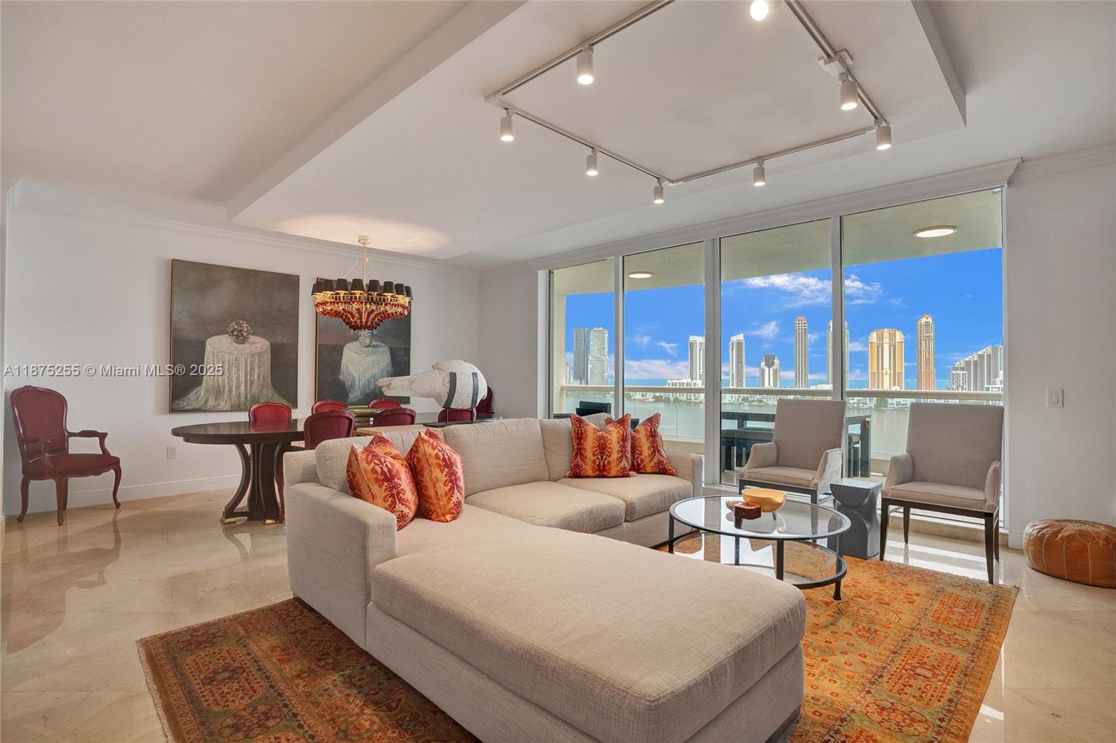 Luxury living at its finest in a home that truly has it all! Exquisite unit featuring stunning panoramic Ocean, Intracoastal, &City Views. 2 balconies, Impact Glass, Marble Flrs, Upgraded Kitchen-Designed for culinary enthusiasts:featuring 2 large cooking islands, quartz countertops, backsplash, dual Sub-Zero 36" refrigerator-freezer, Cove dishwasher, Wolf gas stove w/oven +combo 2nd oven/microwave w/hood. Indulge in the steam shower, and enjoy the serene view from the large bay window in the master suite. Add'l multipurpose rm can serve as a 4th bedroom/office. High Ceilings, built-in cabinets & custom closets throughout. Live in a top-rated bldg incl gym, coffee bar, movie theater, board room, guest suites,& pool area w/a putting green, Social rm equipped w/dance flr, bar,& full kitchen.