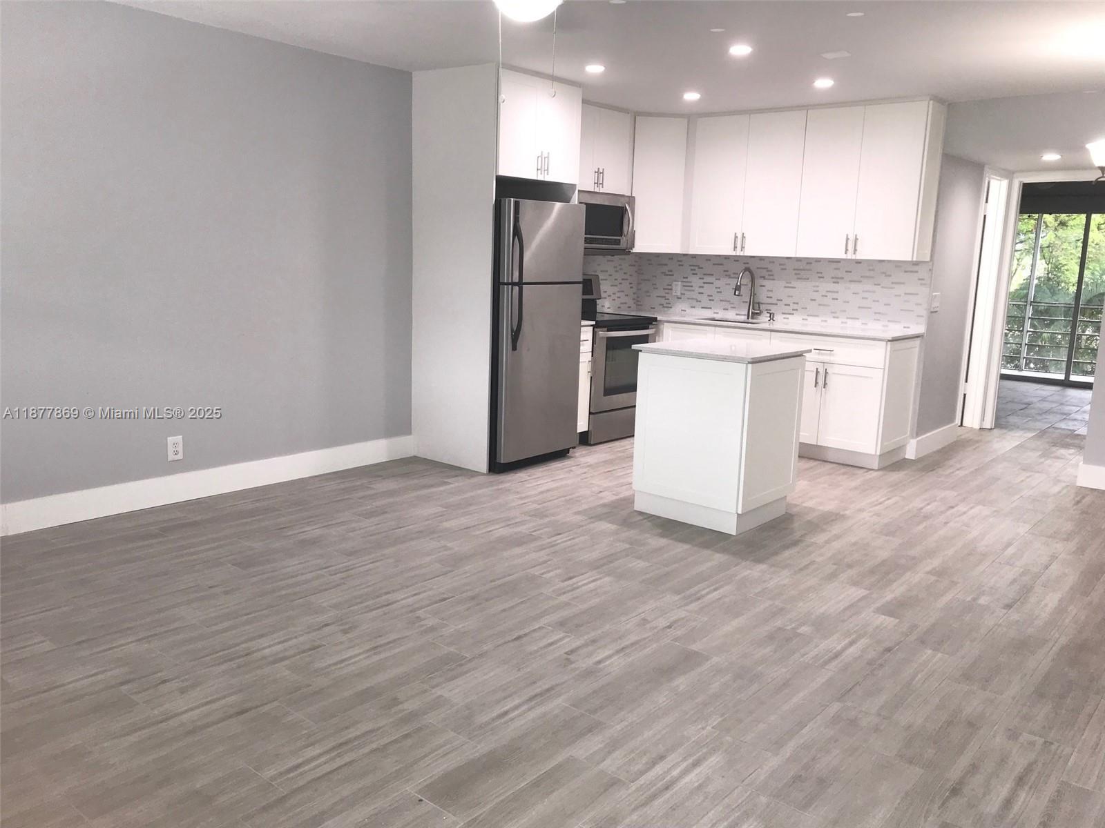 RENT-ABLE Unit...... states 55 Plus Community, Beautifully updated 1/1 move in ready. Bright White kitchen with Quartz Counter Tops with tile back-splash, stainless steel, New wooden White Cabinets. Beautiful Community Amenities: The state of the art club house, Pools, Fitness Center , Ping pong, Indoor Pool, Barbecue area, Tennis, Shuffle board, Bike Trails, Walking Paths, Library, Woodwork Shop, Dance Place, Cafe & Restaurant and Game room. Close to Supermarkets, shopping, casino, 10 minutes from the amazing Deer-field Beach and fishing pier. Renting is allowed in this building.