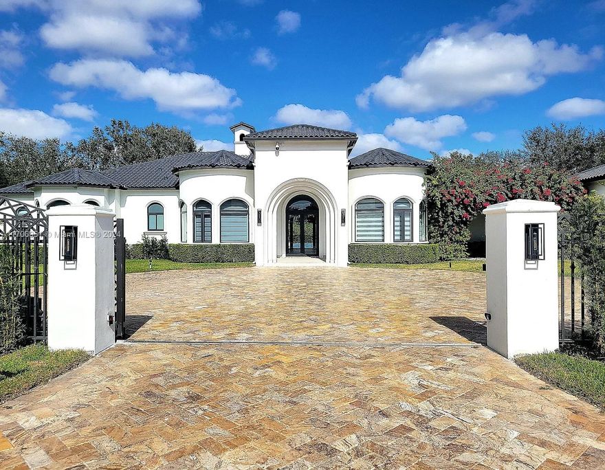 Luxurious 7/5.5 single family corner home on builder's acre. Newly remodeled from floor to ceilings. Gourmet kitchen, gas appliances, wood cabinets, granite countertops, stainless steel appliances, large office, wine cellar, & fire place. Expansive yards. Custom pool! Gazebo includes custom bar and grill & guest room with bathroom. Giant primary bedroom with large bathroom and walk-in closet. 3 car garage with lift for 4th car. Centrally located close to Baptist Hospital, Dadeland Mall, Whole Foods, Pinecrest, Gables, Riviera Prep School, US 1, the 826, & just minutes from MIA.