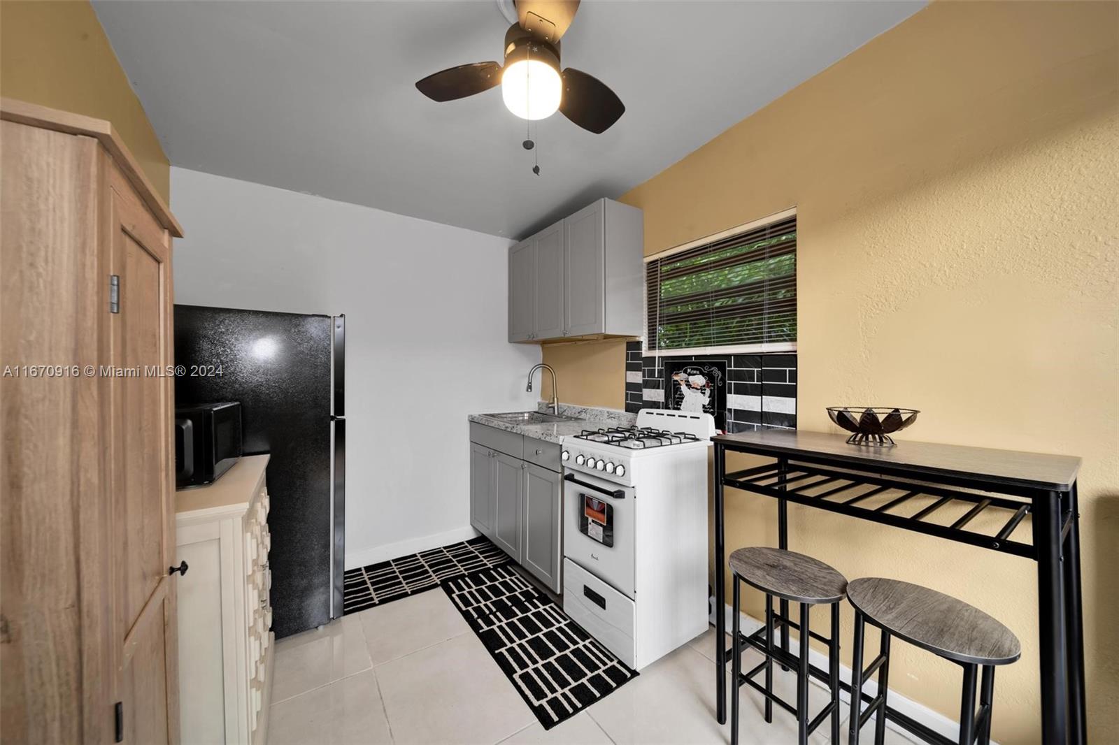 Charming, newly renovated 1-bed, 1-bath rental in Miami Gardens!
Perfect for a single occupant seeking minimalist living, this cozy unit includes utilities such as electricity, WiFi, water, and trash. The kitchenette features a compact stove, oven, microwave, fridge, new cabinets, and pantry. Enjoy meals or relax in the comfortable living area. The private bedroom has a full-size bed with storage and a roomy closet. The bathroom is efficiently designed with all essentials. No pets, no smoking. One parking space available. Conveniently located near the stadium, major highways, and shopping, this unit offers easy, stress-free living in a prime location.