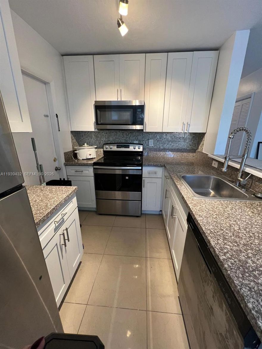 Remodeled Single Family home for rent featuring 2 bedrooms, 1 bathroom, plus 2 additional rooms that can be used as bedrooms, at home office or flex space. No HOA. Shared backyard available, perfect for relaxing or enjoying outdoor time. Conveniently located near shopping, dining, and main roads between I-95 and the Florida Turnpike. Proximate to Roosevelt Park. A great rental opportunity with extra space! Fast approval!!!