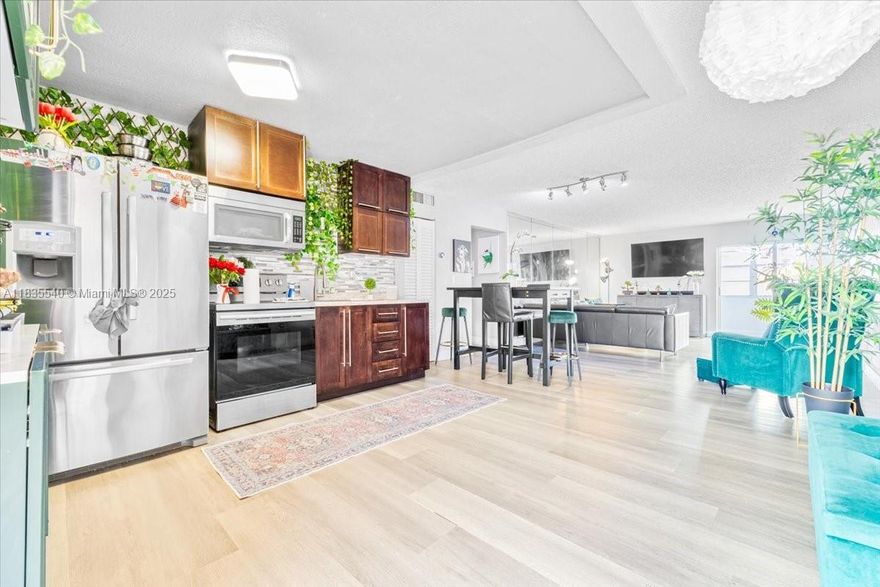 Stunningly updated 3-bedroom, 2-bath corner unit in Hialeah! Nestled in a well-kept community featuring a tennis court, pool, elevators, and on-site laundry facilities. As a corner unit, it offers extra space, abundant natural light, and only one shared wall for added privacy. The master bedroom with independent exit, allowing you to make that part of the house independent.This spacious condo boasts contemporary finishes and a smart, functional layout. Ideally located near shopping centers, dining options, and major highways for added convenience. Please schedule showings through ShowingTime with at least 24 hours’ notice.