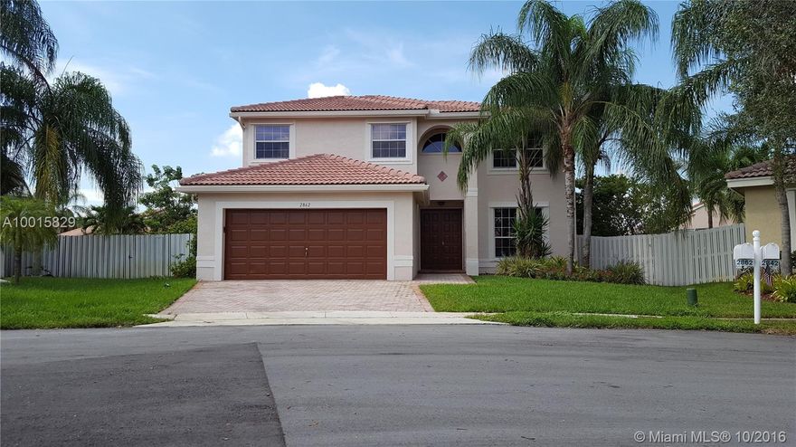 What an amazing yard!  Perfect 4/2.5 home in Coconut Shores.  The home sits on an oversized lot with a very large wood deck surrounded by fruit/shade trees and there's still plenty of room for the kids to run around!  The kitchen has recently been renovated, all baths have just been renovated in neutral colors.   Large family area, breakfast area, separate living and dining rooms.  The 2nd floor has dark laminate wood flooring throughout, spacious bedrooms.  A must see!!