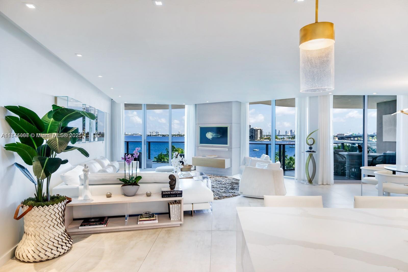 Stunning Custom 3257 sq ft 4 bedrooms (all en suite) 4.5 bathrooms! Gorgeous direct unobstructed views of the bay, Margaret Pace park, and the best of Edgewater. Enjoy a fully custom kitchen equipped with a built in sub-zero wine fridge, Bosch appliances and an oversized walk in pantry. Primary bedroom consists of double closets, bathroom with tub and shower, and double sinks. All rooms are equipped with black out shades as well as draperies. Aria on the bay has top of the line amenities including 2 pools (sunrise & sunset), hot tub, spa with sauna, steam room, kids play room, theater, and fitness center. Also enjoy amenities across the street open to the public such as Tennis, dog park, playground, and more. 3 Parking spaces.