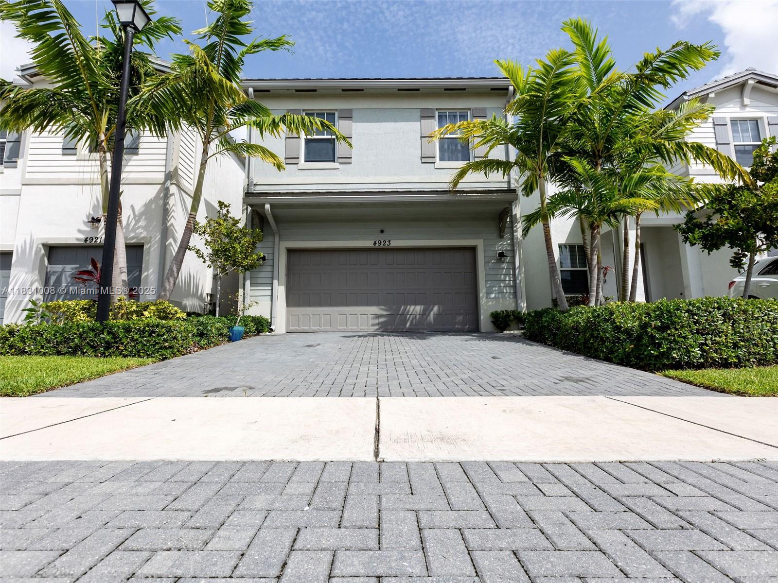Discover the perfect blend of comfort and style in this beautiful 4-bedroom, 2.5-bathroom home built in 2021. Located in a desirable neighborhood, this residence offers the lifestyle you’ve been dreaming of.
Step into the foyer that leads to a bright, open living space featuring large sliding doors that flood the area with natural light, creating an ideal setting for relaxing mornings or cozy evenings. The open layout seamlessly connects the living room, dining area, and modern kitchen, making it easy to host gatherings or enjoy family dinners. The kitchen is designed for everyday luxury, boasting stainless steel appliances, granite countertops, rich wood cabinetry, and a spacious pantry. You'll also enjoy the lovely private backyard, which features plenty of trees and lush grassy areas.