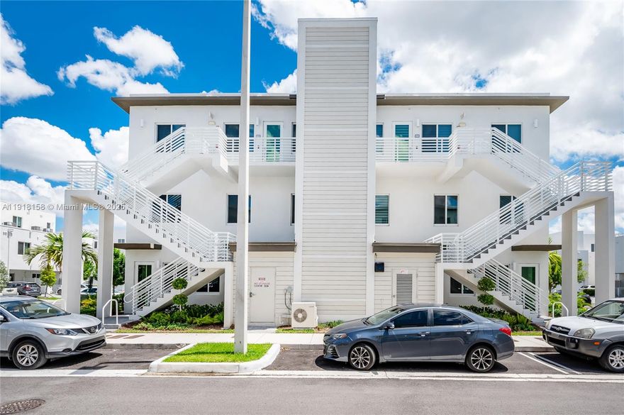 BRIGHT & SPACIOUS 3 bed /2.5 bath townhouse at exclusive LANDMARK at Doral. First floor entry with assigned parking just outside back entrance. Bedrooms upstairs. **BRAND NEW LAMINATED WOOD FLOORING STAIRS AND BEDROOMS - SECOND FLOOR**Community offers outstanding LANDMARK Clubhouse, resort style pool, tennis, exercise room, and much more. Amazing location in Doral with close proximity to fine shopping, restaurants, A+ schools and much more. Enjoy SE Florida at its best!