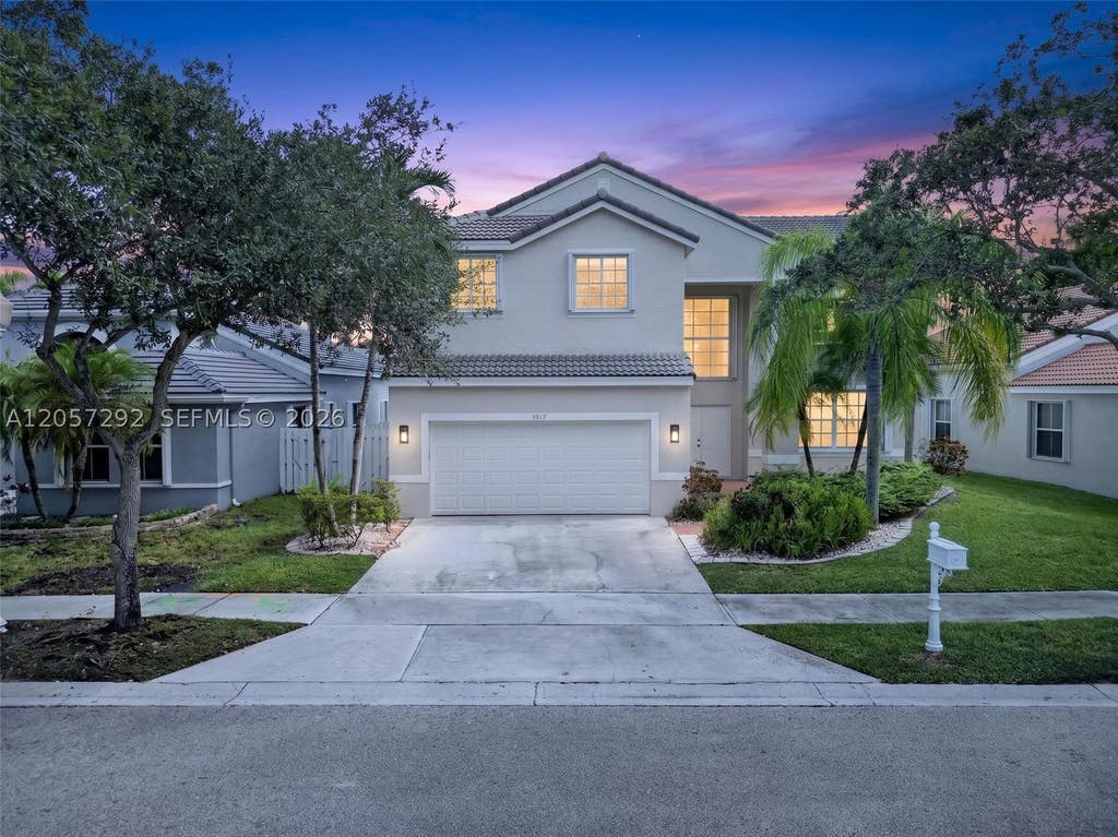 Photo of 1012 Cedar Falls Dr, Weston, FL 33327 (MLS # A12057292)