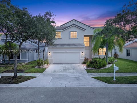 Photo of 1012 Cedar Falls Dr, Weston, FL 33327 (MLS # A12057292)