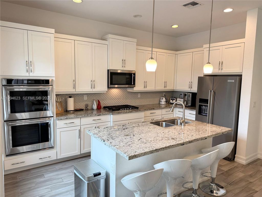 Photo of 11455 Solstice Cir, Parkland, FL 33076 (MLS # A11994623)