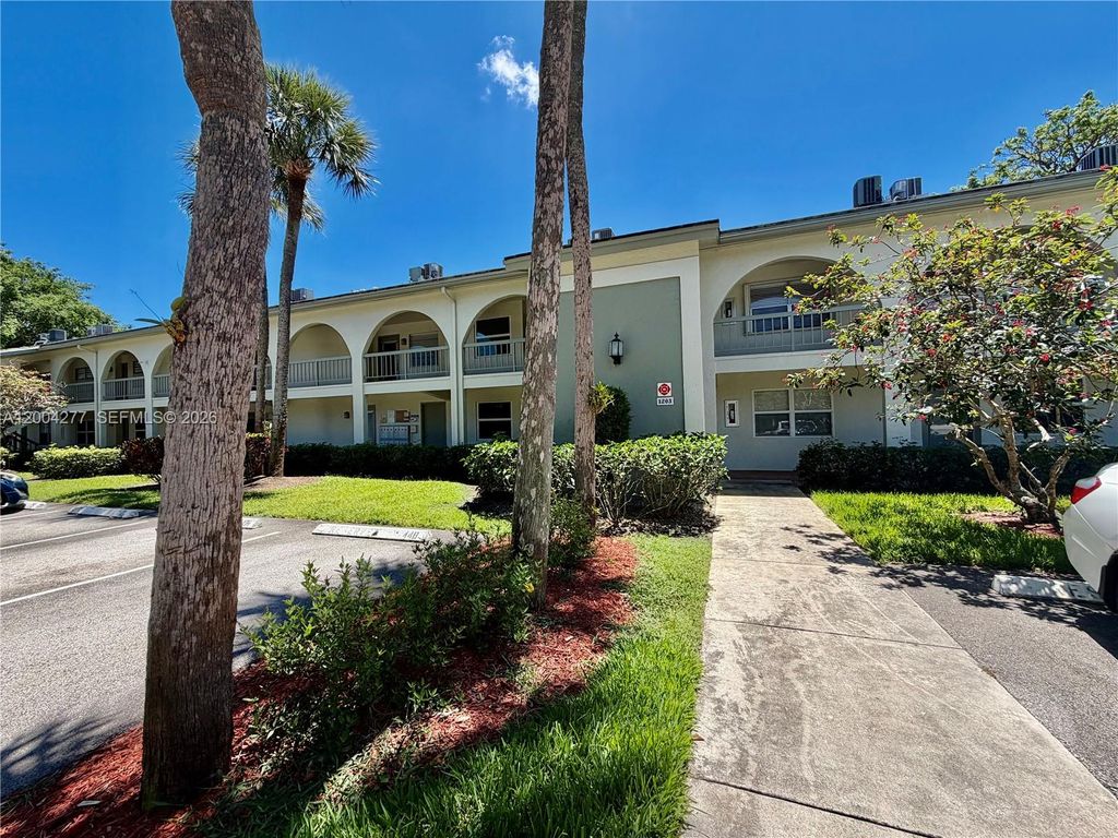 Photo of 1203 Bahama Bnd #G1, Coconut Creek, FL 33066 (MLS # A12004277)
