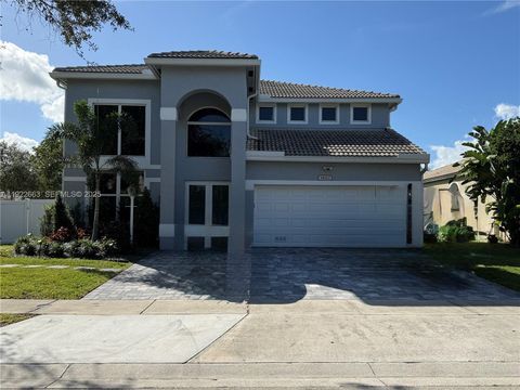 Photo of 14212 NW 23rd St, Pembroke Pines, FL 33028 (MLS # A11922663)