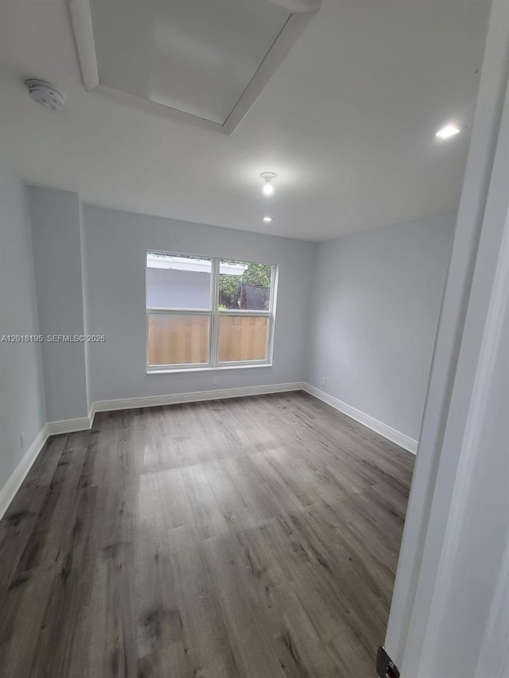Photo of 1809 NW 8th Pl, Fort Lauderdale, FL 33311 (MLS # A12018195)