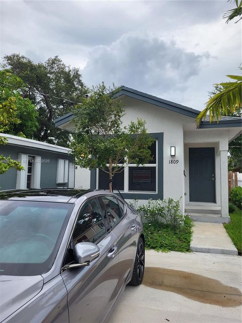 Photo of 1809 NW 8th Pl, Fort Lauderdale, FL 33311 (MLS # A12018195)