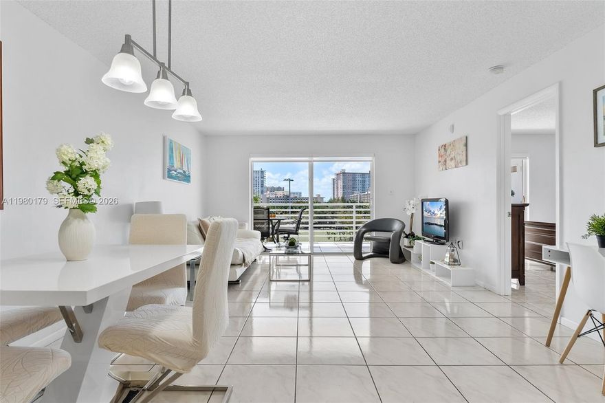 Five Minutes Walk to the Beach, Large CORNER 2br/2ba 1,330 sqft with Side by Side Washer & Dryer Inside in Gated Quiet Boutique Le Frontenac in Sunny Isles Beach! Huge balcony with Gorgeous PARK & POOL View. Tiled throughout, open kitchen with natural light, split floor plan & private primary bedroom, two walk-in closets, NEW AC, Washer & Drier 2025'. No special assessments. Short term rentals allowed. SUPER WALKABLE, with shopping, restaurants, shops, GREAT SCHOOL within a couple of minutes. Breezy air on the balcony. Life is good here.