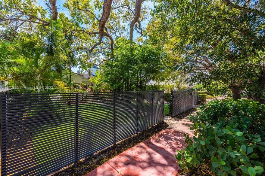 Brand new as of 2017, with no expense sparred! The sun-drenched sanctuary is surrounded by mature lush gardens that can all be taken in through its floor to ceiling, wall-to-wall glass structures. Masterfully preserving all the historic features.Dramatic vaulted ceilings welcomes you the moment you enter with wonderful views of the tropical pool loggia.The 5 bedroom home features wide plank white oak flooring, gourmet kitchen boasts an oversized island, gas Viking range, Subzero and Miele appliances.The primary suite is a glass spa retreat on its own. Gym, a tower suite perfect for teenagers, in-laws or staff with a separate entrance.The home is gated with carport.