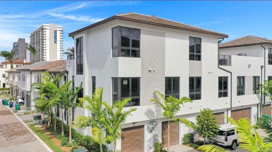 Live in the exclusive Doral's Premier Community of Canarias Downtown Doral. This UNIQUE townhome (MODEL TAHITI) features 3 floors, 5 bedrooms, 4 bathrooms modern home with One room and bathroom located in the first floor. Porcelain Floors on the first floor and Premium wood floors in all bedrooms and staircase. Statement staircase with stainless steel hand rails and stringers. Impact windows, LED recessed square lighting throughout home. Front load washer and dryer. Built in smart home technology. Quartz Countertop with high polish lacquer cabinets, 2 car garage, huge laundry room. Neighborhood features gorgeous club house and pool. , A+ rated schools, lots of recreational areas for kids and family, restaurants, supermarkets, etc. BRING YOUR PICKIEST BUYERS!