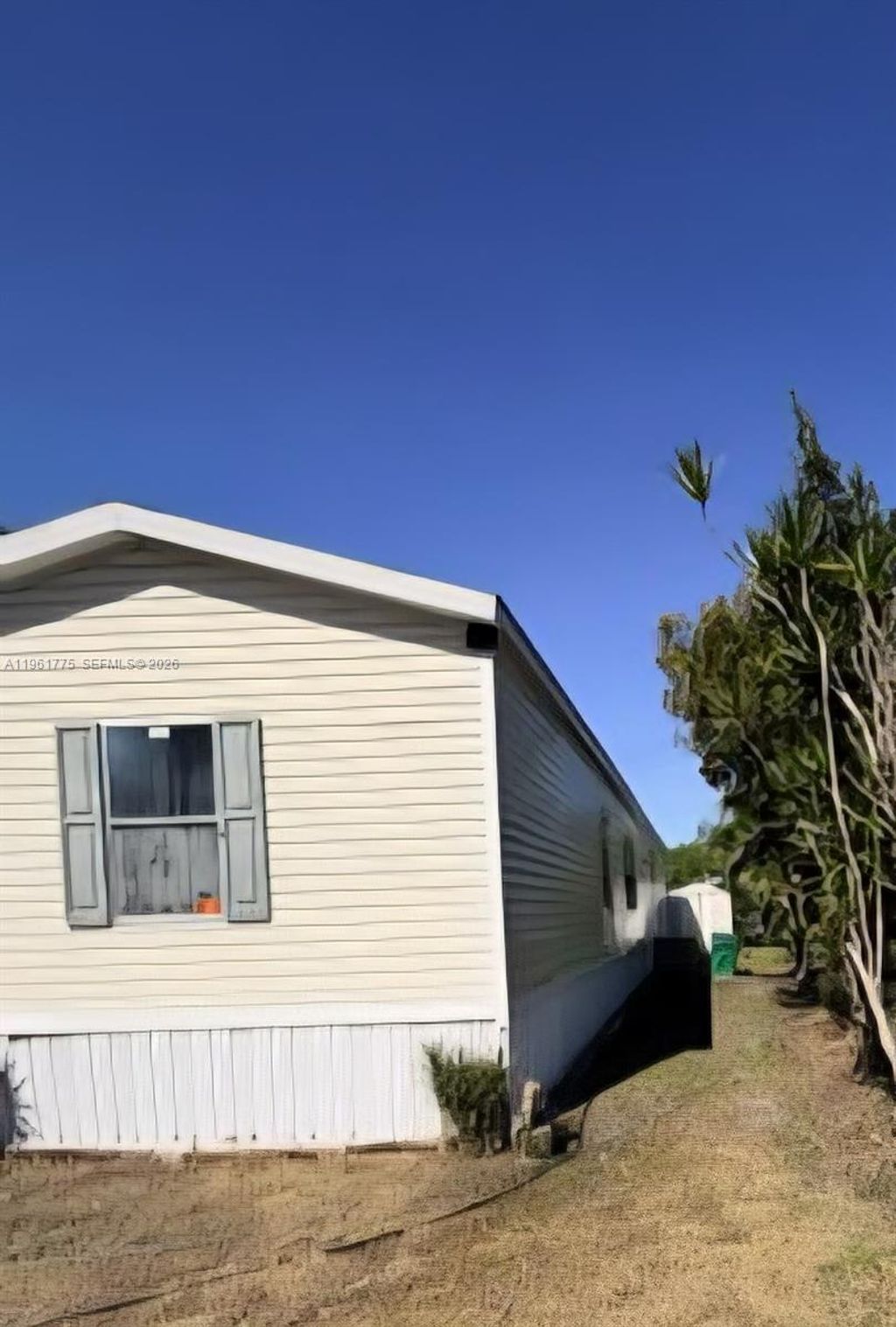 Photo of 411 SW 131 Ave, Davie, FL 33325 (MLS # A11961775)