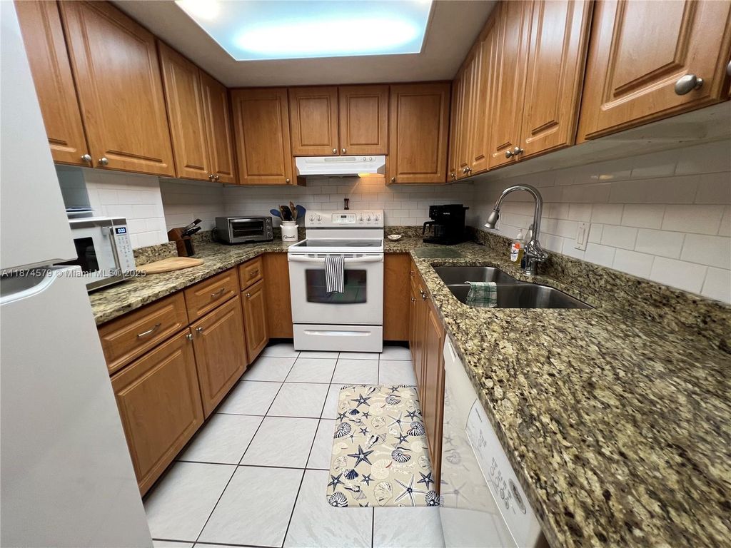 Photo of 125 Ocean Ave #603, Palm Beach Shores, FL 33404 (MLS # A11874579)