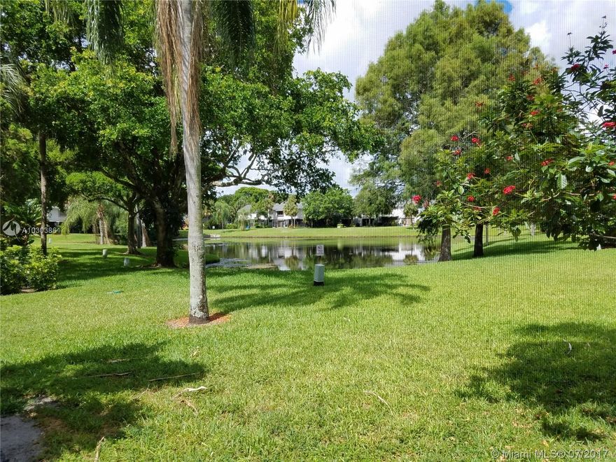 Affordable Townhouse with Lake View - Spacious Room Sizes -Master Bedroom & Large Covered Screened Patio Overlook the Beautiful Lake - Lovely tree lined complex in a quiet neighborhood with Basketball, Tennis, Pool, exercise room and more.  Washer and Dryer hookup inside your home for added convenience.  2 Pets up to 30 lbs. each. Association requires max. financed amount of 93%. Request an Appointment today!