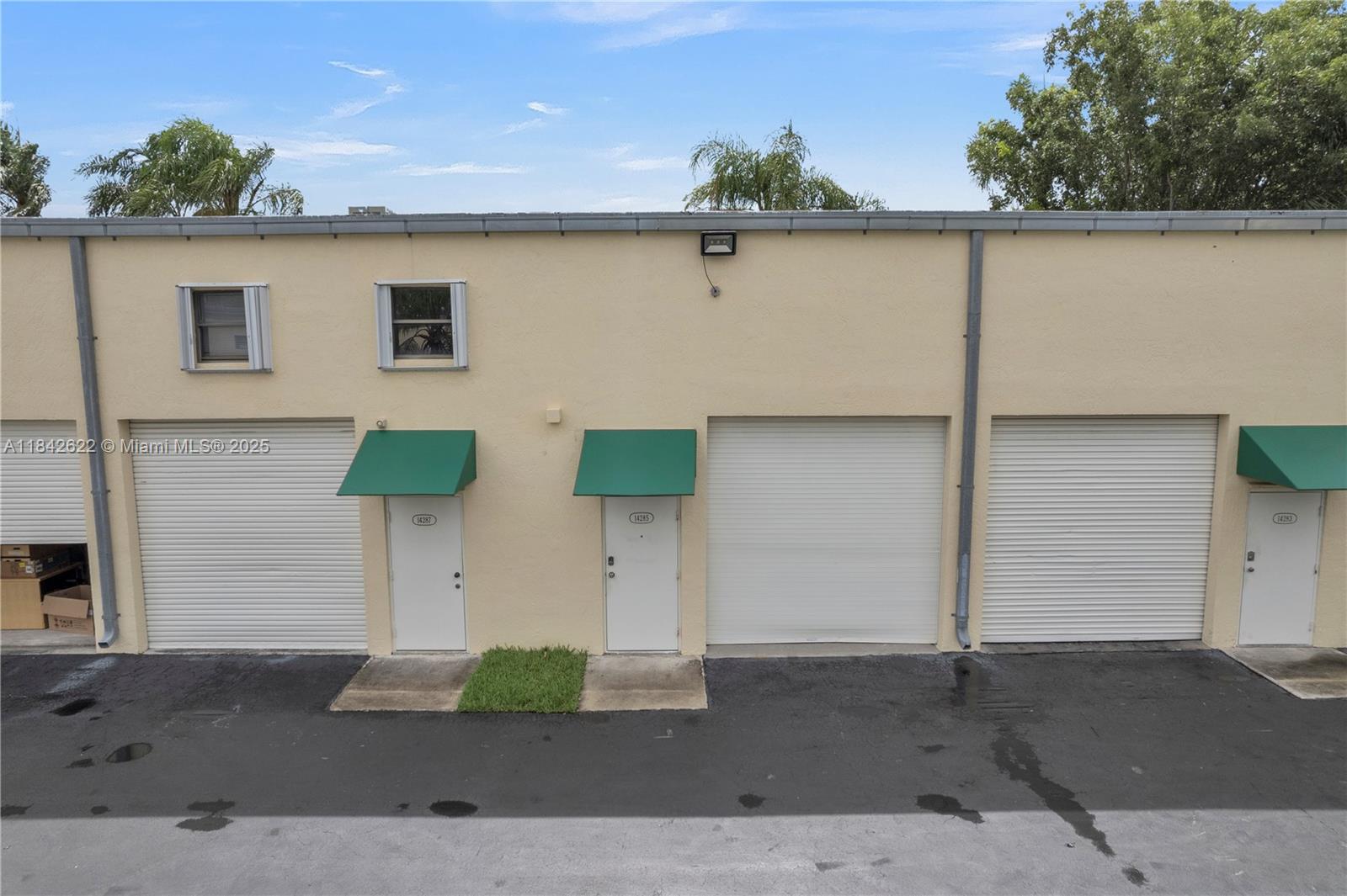Ideally located within the Tamiami Park Industrial Park, offering seamless access to the FLTurnpike and State Highway 874. Situated within a secluded complex at the end of a street, it provides added security with a private gate. Minutes from London Square, expressways, and Tamiami Airport. The warehouse has an area for storage and is air-conditioned with 2 offices and 1 bathroom. It comes with 1 assigned parking space and additional guest parking. Low association dues! This space is perfect for a wide range of businesses, including startups, construction companies, e-commerce businesses, IT services, accountants, distributors, plumbers, carpenters, or simply for extra storage. Not suitable for automotive businesses or manufacturing.