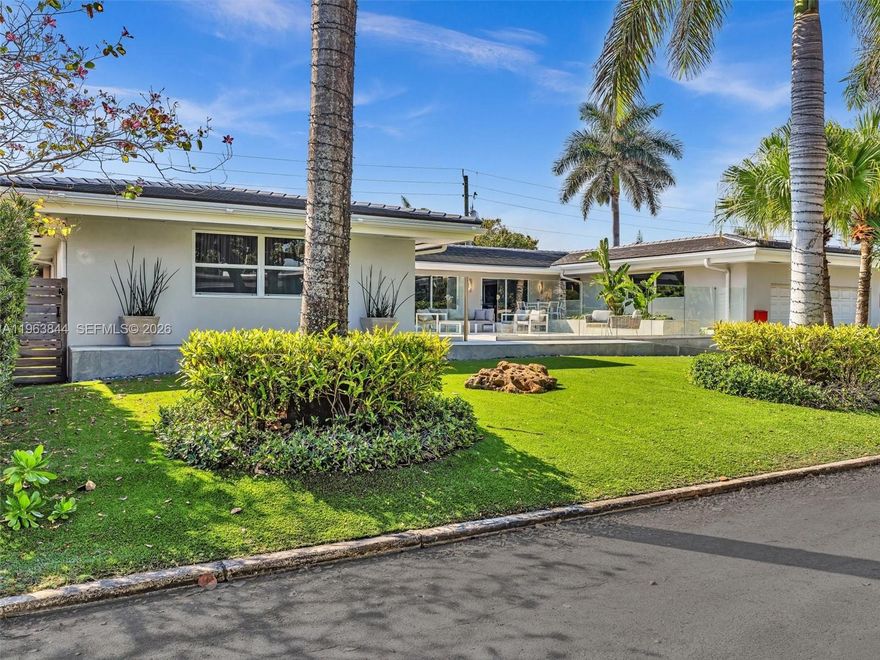 Experience luxury living in this Spacious and beautifully renovated 4 bed, 4.5 bath home in Hollywood Lakes. Offering over 4,800 sq. ft. with waterfront views and a short stroll to Southlake. Key features include a Sub-Zero refrigerator, 3 high-efficiency A/C units, a whole-house generator, newer roof, and impact windows/doors that fill the home with natural light. The spa-like wet room with MTI soaker tub adds a touch of luxury. Outdoors you'll enjoy a fenced backyard with an expansive screened patio/pool combination and large oversized patio in the front with a 2 car garage. Perfect as a primary residence or Airbnb. Walking distance to the beach, Hollywood Broadwalk, and only 10 minutes from Fort Lauderdale Airport. this home truly delivers the ultimate South Florida lifestyle.