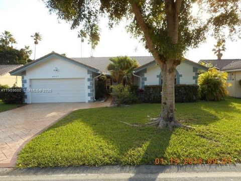 Photo of 4047 NW 115th Ave, Coral Springs, FL 33065 (MLS # A11959660)