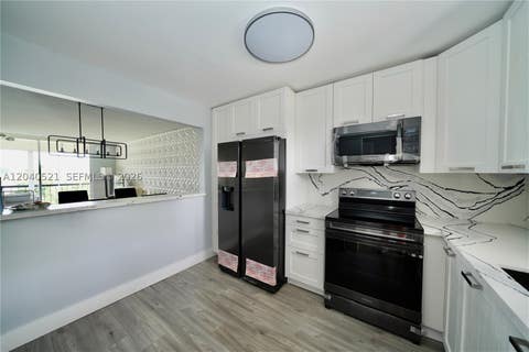 Photo of 2541 Aragon Blvd #305, Sunrise, FL 33322 (MLS # A12040521)